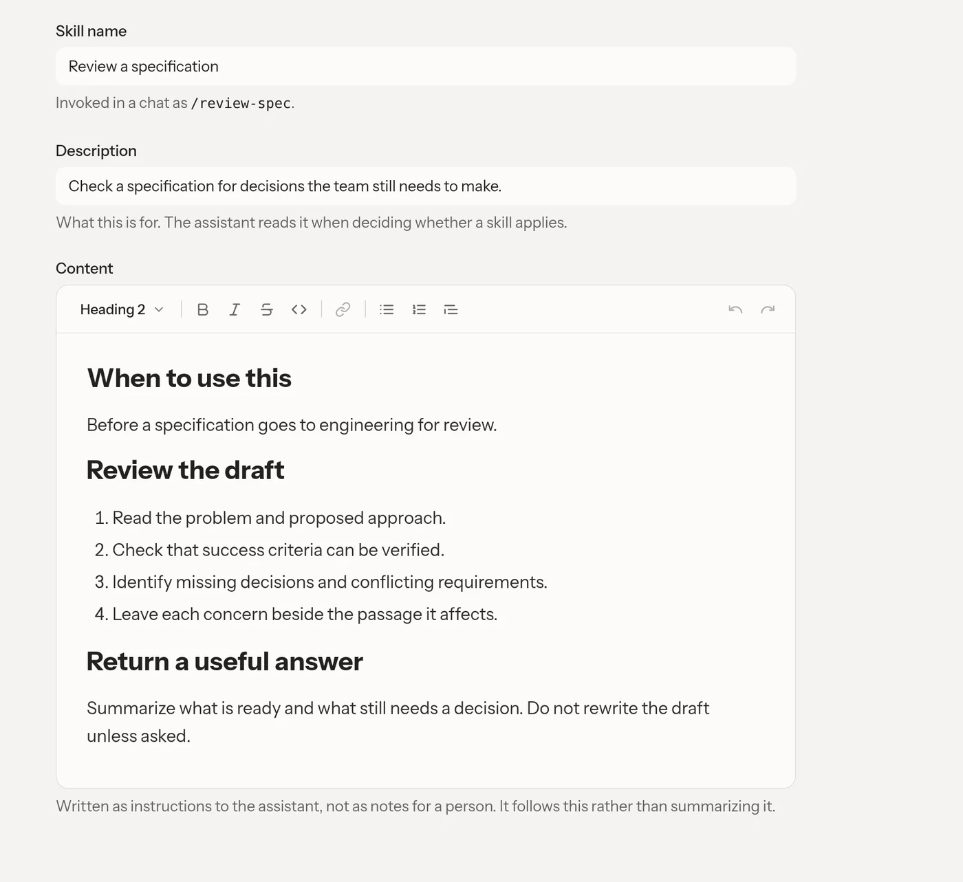 The skill editor with a review-spec handle and a reusable specification-review procedure