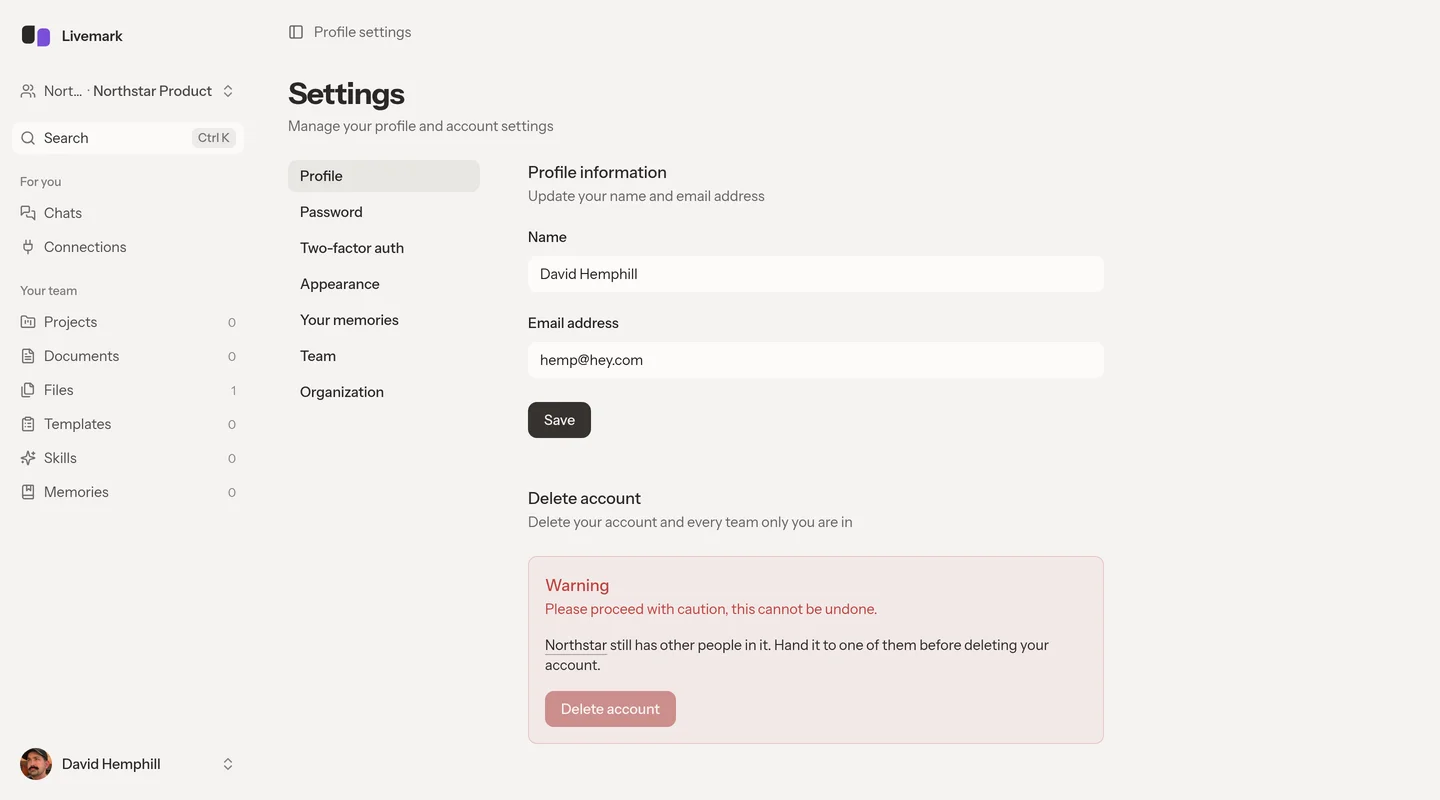 Profile settings with name and email fields and an ownership warning before account deletion